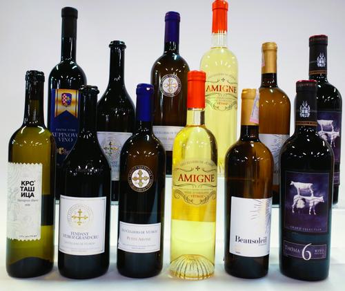 11 BOTTLES SWISS, SERBIAN, EGYPTIAN AND POLISH WHITE AND 1 RED WINE