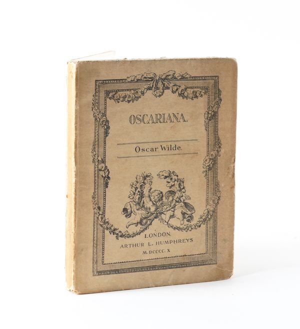 WILDE, Oscar (1854-1900). Oscariana, London, 1910, 12mo, original printed upper wrapper, the lower cover with an embroidered spray of flowers in green, tan and white, within a wide stitched silver wire border.