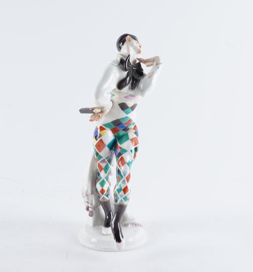 A MEISSEN PORCELAIN RUSSIAN BALLET FIGURE OF THE HARLEQUIN `BAJAZZO'