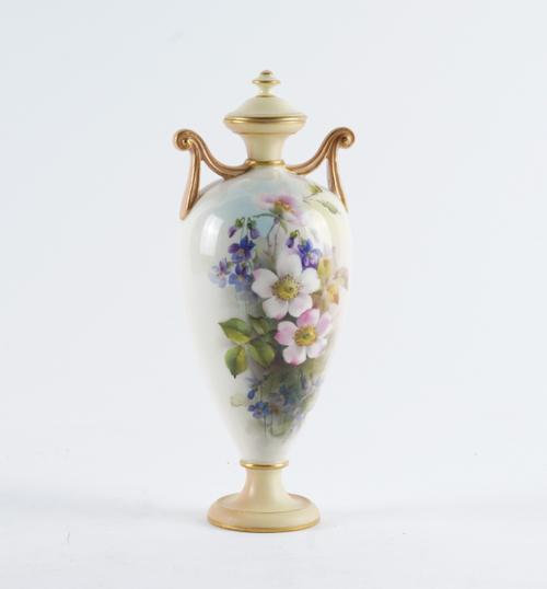 A ROYAL WORCESTER TWO-HANDLED VASE AND COVER (2)