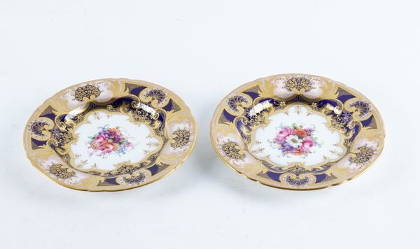 A PAIR OF SMALL ROYAL WORCESTER SIDE PLATES