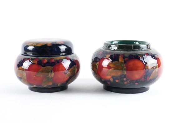 A MOORCROFT TOBACCO JAR WITH A SCREW TOP COVER