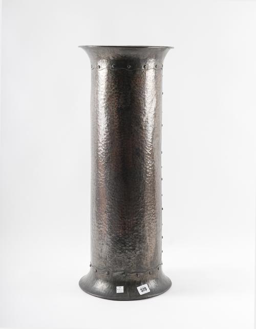 W.A.S BENSON: AN ARTS & CRAFTS SPOT HAMMERED COPPER CYLINDRICAL WALKING STICK STAND