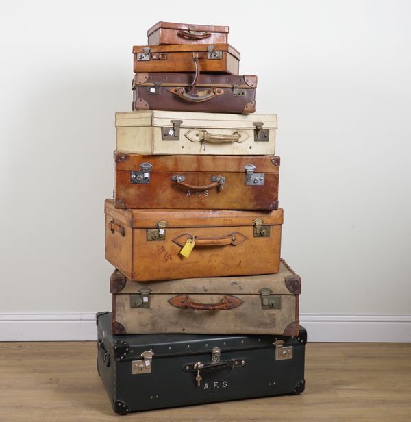 EIGHT GRADUATING VINTAGE SUITCASES AND CASES (8)