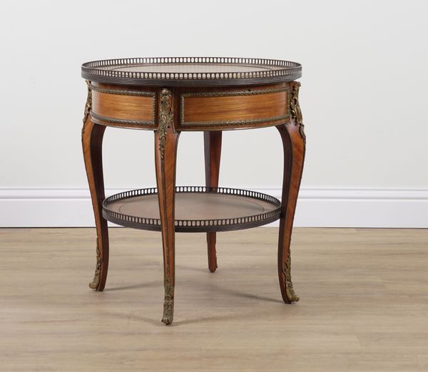 A 19TH CENTURY FRENCH CIRCULAR GILT METAL MOUNTED KINGWOOD LIFT TOP BOULLOTTE TABLE