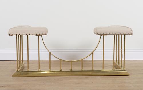 A GILT BRASS CLUB FENDER