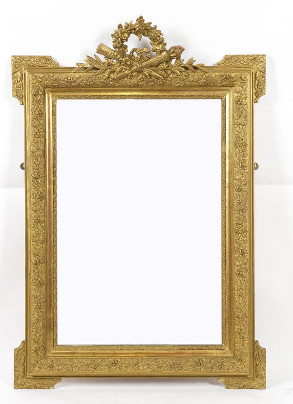 A LOUIS XVI REVIVAL GILT FRAMED MIRROR