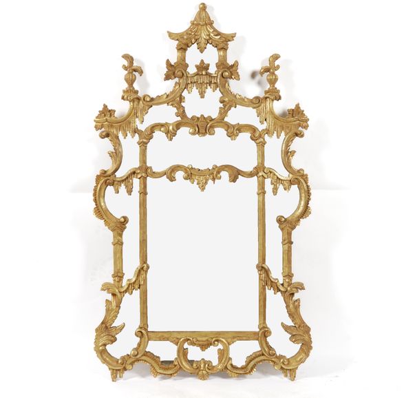 A GILT FRAMED MARGINAL WALL MIRROR OF CHINESE CHIPPENDALE DESIGN