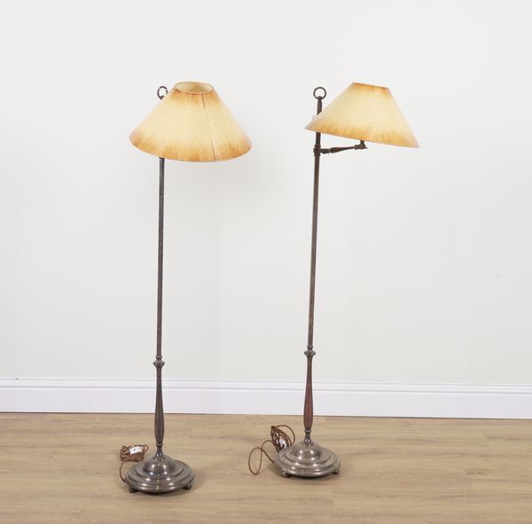 A PAIR OF BESSELINK AND JONES SILVERED ADJUSTABLE FLOOR STANDING LAMPS (2)