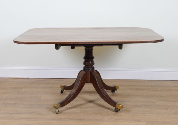 A REGENCY MAHOGANY RECTANGULAR SNAP TOP BREAKFAST TABLE