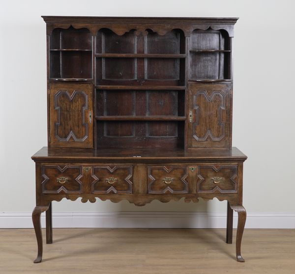 A CHARLES II STYLE OAK THREE DRAWER DRESSER