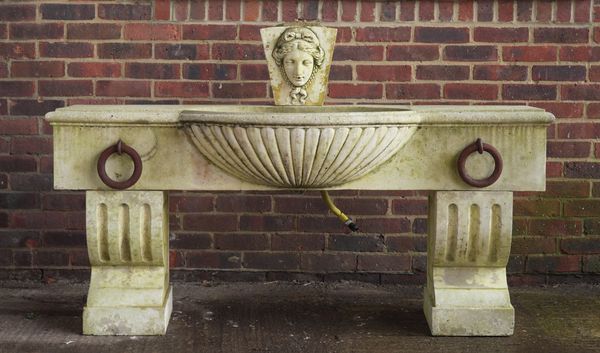 A RECONSTITUTED STONE WATER FEATURE/EQUINE TROUGH