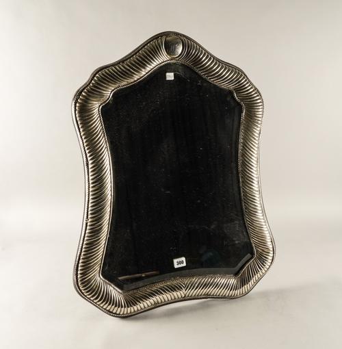 A VICTORIAN SILVER MOUNTED STRUT BACK MIRROR