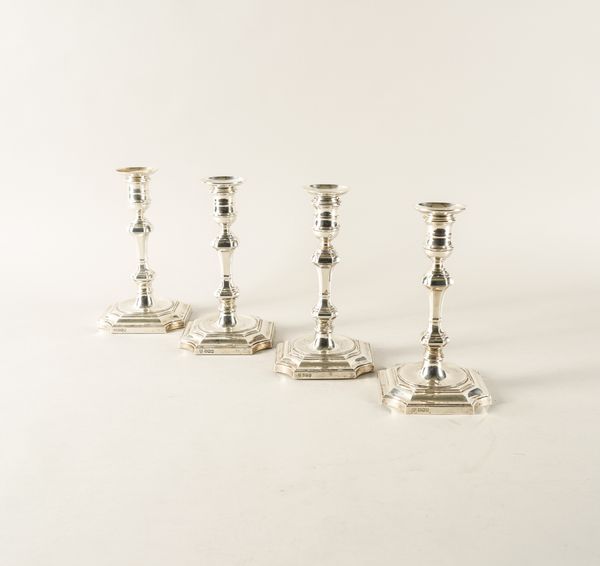 FOUR SIMILAR SILVER TABLE CANDLESTICKS (4)