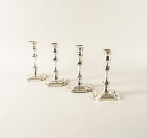 FOUR SIMILAR SILVER TABLE CANDLESTICKS (4)