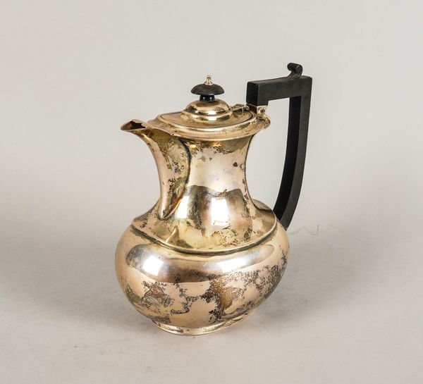 A SILVER HOT WATER JUG