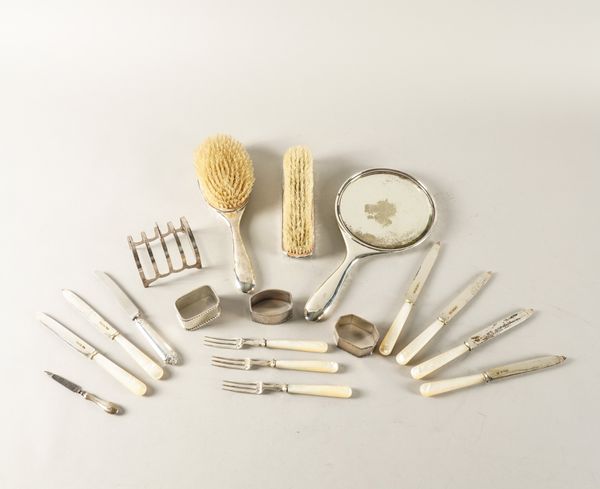 A PART SET OF SILVER AND MOTHER-OF-PEARL DESSERT KNIVES AND FORKS AND NINE FURTHER ITEMS