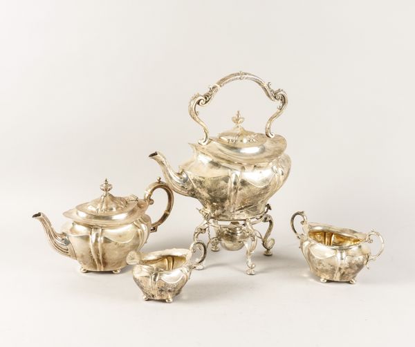 A LATE VICTORIAN SILVER FOUR PIECE TEA SET