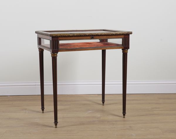 A 19TH CENTURY FRENCH GILT METAL MOUNTED MAHOGANY RECTANGULAR BIJOUTERIE TABLE