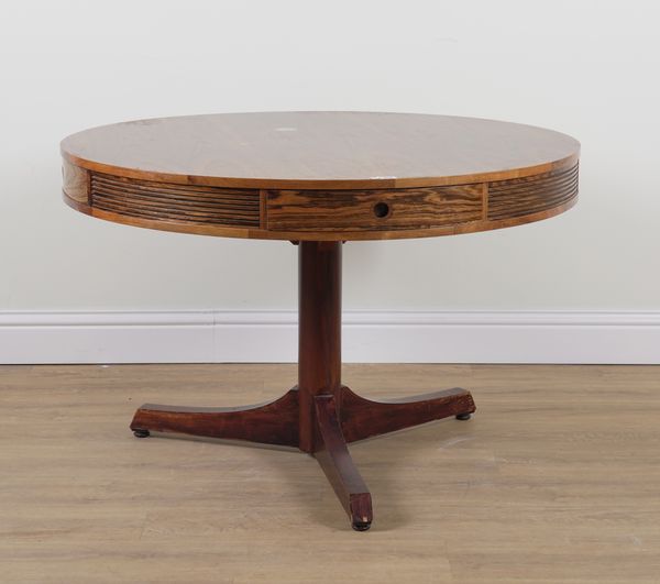 PROBABLY ARCHIE SHINE FOR HEALS FURNITURE; A MID-20TH CENTURY ROSEWOOD CIRCULAR DINING TABLE