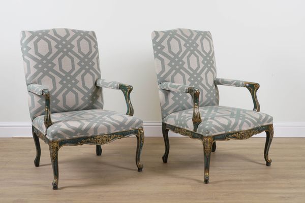 A PAIR OF 18TH CENTURY STYLE PARCEL GILT GREEN PAINTED OPEN ARMCHAIRS (2)