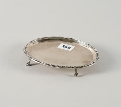 A GEORGE III SILVER TEAPOT STAND