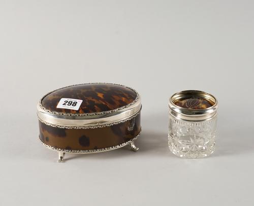 A SILVER AND TORTOISESHELL OVAL BOX AND A GLASS TOILET JAR (2)