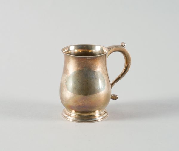 A SILVER CHRISTENING MUG