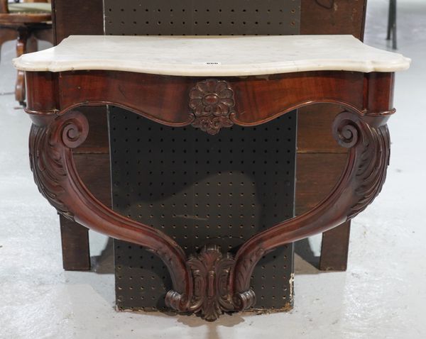 A VICTORIAN SHAPED MARBLE TOPPED CONSOLE TABLE