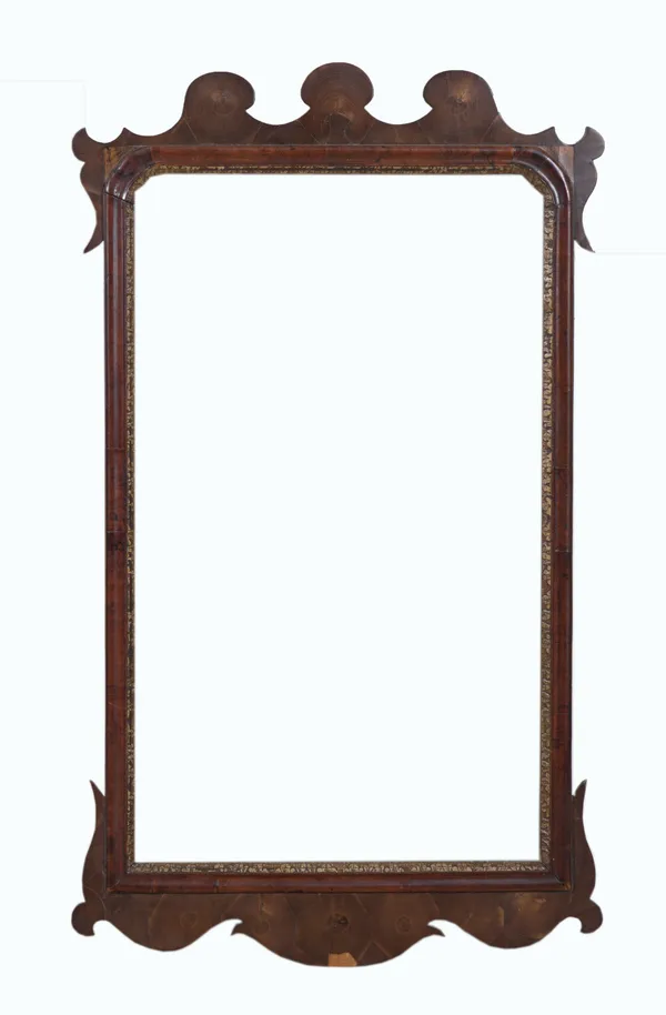 AN 18TH CENTURY WALNUT FRET CUT PEIR MIRROR