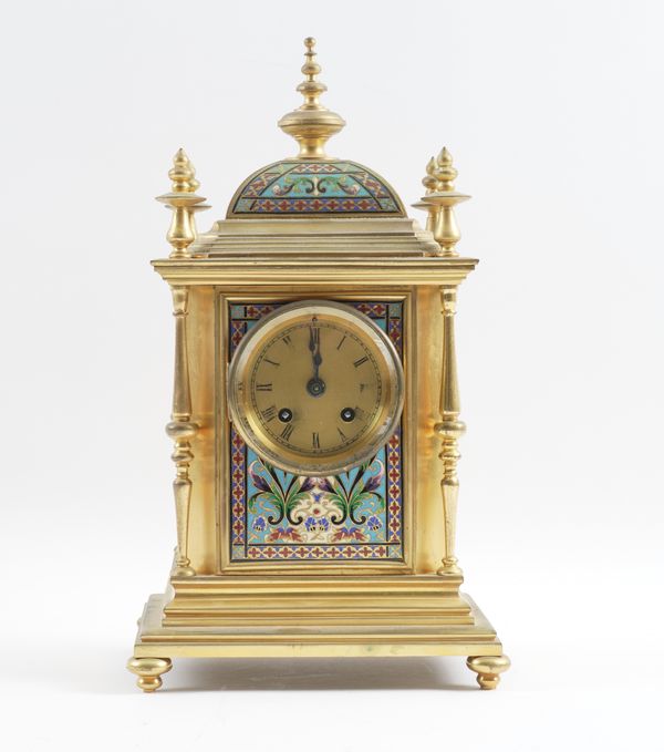 A FRENCH GILT BRASS CHAMPLEVÉ ENAMEL MANTEL CLOCK