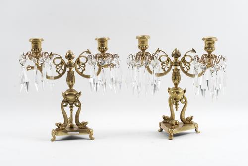 A PAIR OF REGENCY GILT-BRASS TWIN LIGHT CANDELABRA (2)