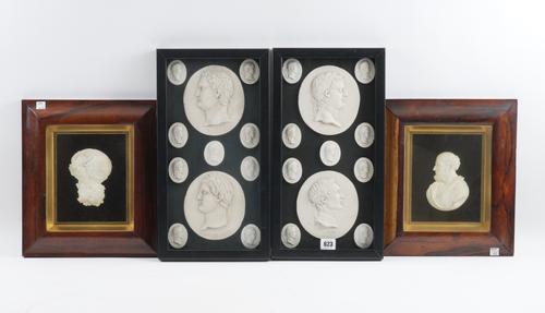 A PAIR OF FRAMED SETS OF PLASTER INTAGLIOS (4)