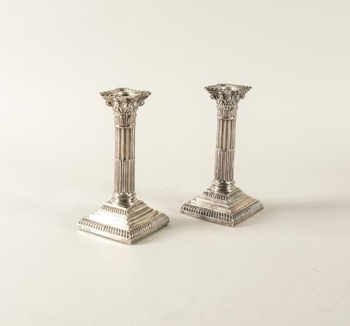 A PAIR OF VICTORIAN SILVER TABLE CANDLESTICKS
