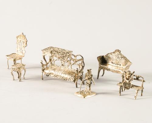 A GROUP OF SEVEN SILVER CABINET MINIATURES (7)