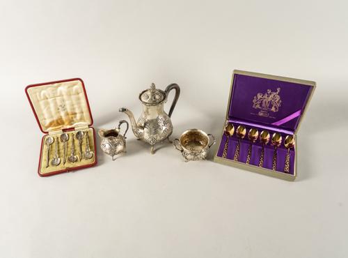 A GERMAN THREE PIECE COFFEE SET AND TWO SETS OF SIX TEASPOONS (5)