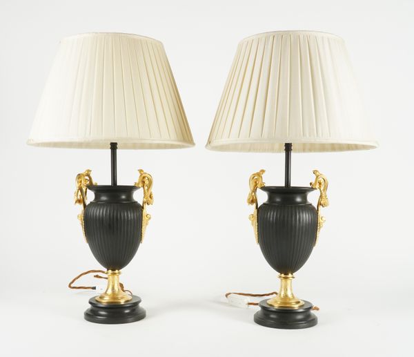 A PAIR OF BLACK AND GILT METAL OVOID TABLE LAMPS (2)