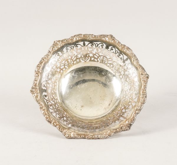 A SILVER SHAPED CIRCULAR DISH