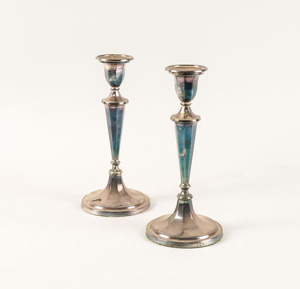 A PAIR OF SILVER TABLE CANDLESTICKS