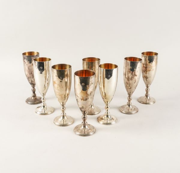 A SET OF EIGHT SILVER WINE GOBLETS (8)