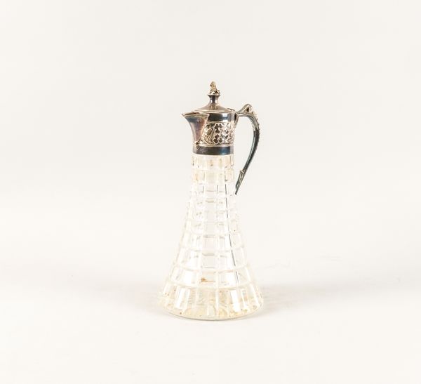 A SILVER MOUNTED HOBNAIL CUT GLASS CLARET JUG