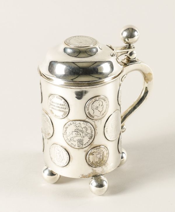 A GERMAN HINGE LIDDED TANKARD