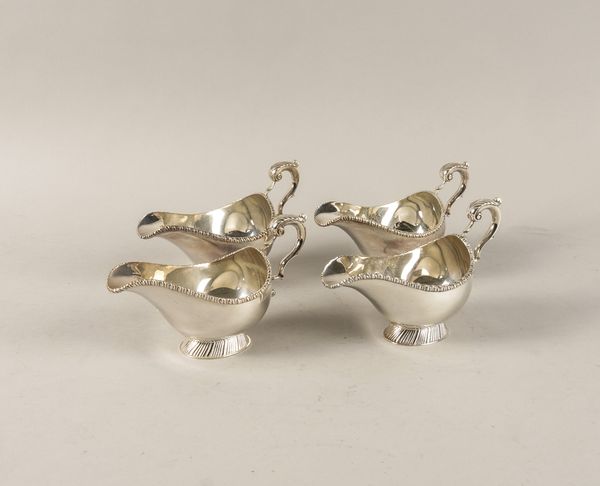 A SET OF FOUR SILVER SAUCEBOATS (4)