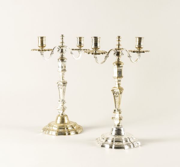 A PAIR OF PLATED TWIN LIGHT TABLE CANDELABRA (2)