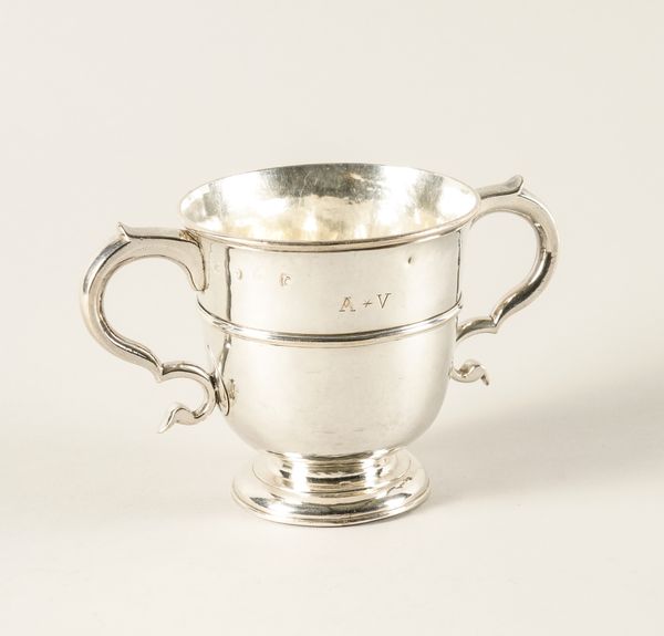 A GEORGE I BRITANNIA STANDARD SILVER TWIN HANDLED CUP