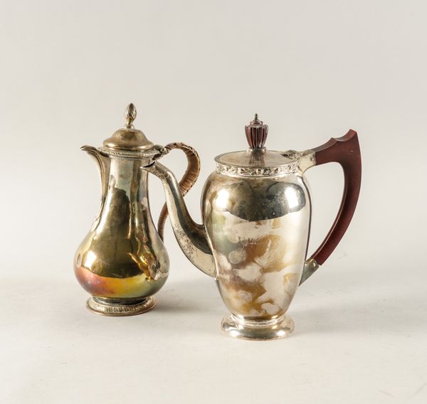 A SILVER COFFEE POT AND A SILVER HOT WATER JUG (2)