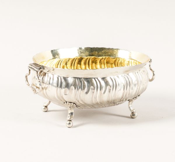 A SILVER SHAPED OVAL TWIN HANDLED BOWL