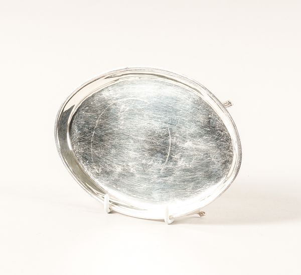 A GEORGE III SILVER OVAL TEAPOT STAND