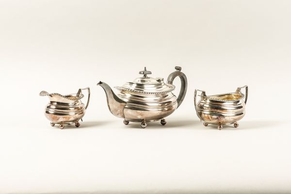 A PLATED THREE PIECE TEA SET (3)