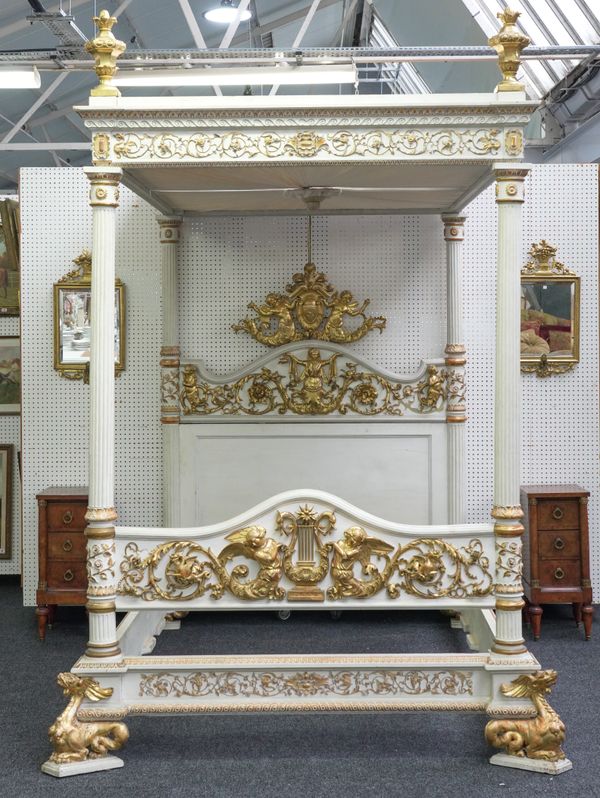 AN ITALIAN WHITE-PAINTED AND PARCEL-GILT FOUR POSTER BED